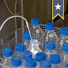 A basket of bottles ready to be autoclaved, with the load probe highlighted