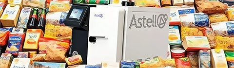 AMB benchtop autoclave surrounded by packaged food and drinks