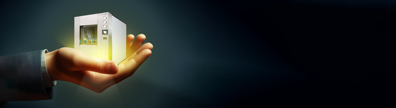 An image of a hand holding a tiny glowing autoclave